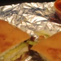 Tortas · Mayo, lettuce, tomatoes, onions, jalapeños, avocado, beans and Mexican cheese.