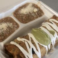 Chimichanga · Served with rice & beans.