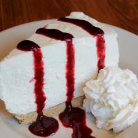 Cheesecake · House made creamy whipped cheesecake with a graham cracker crust topped with house made Nort...