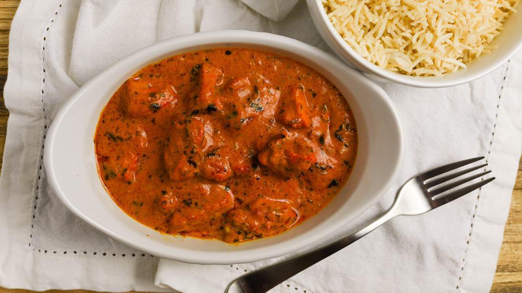 Chicken Tikka Masala · Chicken breast cooked with spice and cream and served with basmati rice.