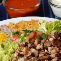 Carnitas · Tortillas. served with rice and beans.