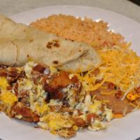 Bacon Burrito  · Potato, egg, and cheese.
