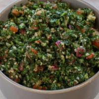 Tabbouleh · Tabbouleh is a  salad made mostly of finely chopped parsley, with tomatoes, mint, onion, bul...