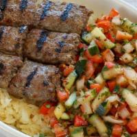 Kofta Kebab Bowl · Ground beef kebabs served with rice, Israeli salad and pita.