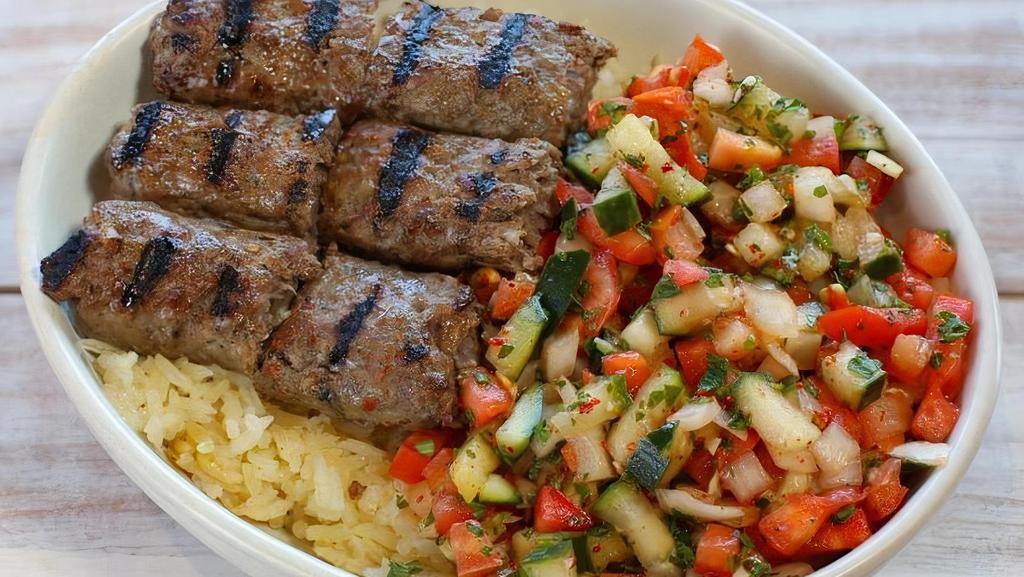Kofta Kebab Bowl · Ground beef kebabs served with rice, Israeli salad and pita.