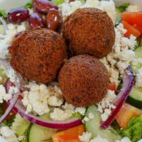 Falafel Salad · Served with lettuce, tomatoes, onions, cucumbers, feta cheese, olives, tahini sauce and pita...