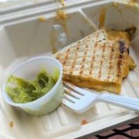 Chicken Quesadilla · Grilled Chicken Breast strips, Green Chilies and Cheddar Jack grilled in a flour tortilla se...
