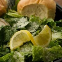 Caesar · Romaine lettuce, parmesan cheese, seasoned croutons and creamy Caesar dressing.