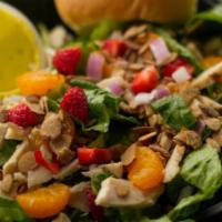 Strawberry Chicken Salad · Romaine lettuce, chicken, strawberries, mandarin oranges, red onion, candied almonds and pop...