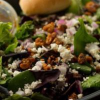 Spinach Salad · Spring mix spinach, walnuts, craisins, red onions, feta cheese, and balsamic vinaigrette dre...