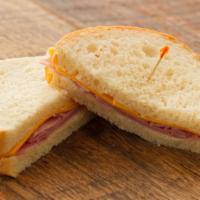 Ham & Cheddar · Served on thin-cut Honey White bread with mayonnaise.