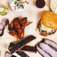 Barbecue Family Meal · Two meats and three sides-enough for two adults and two kids. Two sauces, jalapeño-IPA pickl...