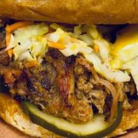 Lunch Pulled Pork · Toasted brioche bun, incredible smoked sauced and seasoned pulled pork shoulder, Tangy Vineg...
