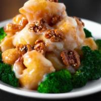 Walnut Shrimp · Lightly battered shrimp coated with our special creamy sauce garnished with honey glazed wal...