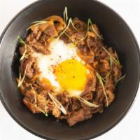 Gyudon Beef Bowl · Japanese beef rice bowl with a fried egg in the middle.