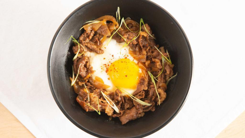 Gyudon Beef Bowl · Japanese dish consisting of a bowl of rice topped with beef and onion simmered in a mildly flavored sweet sauce. Consuming raw or undercooked meat, poultry, seafood, shellfish, or eggs may increase the risk of foodborne illness.