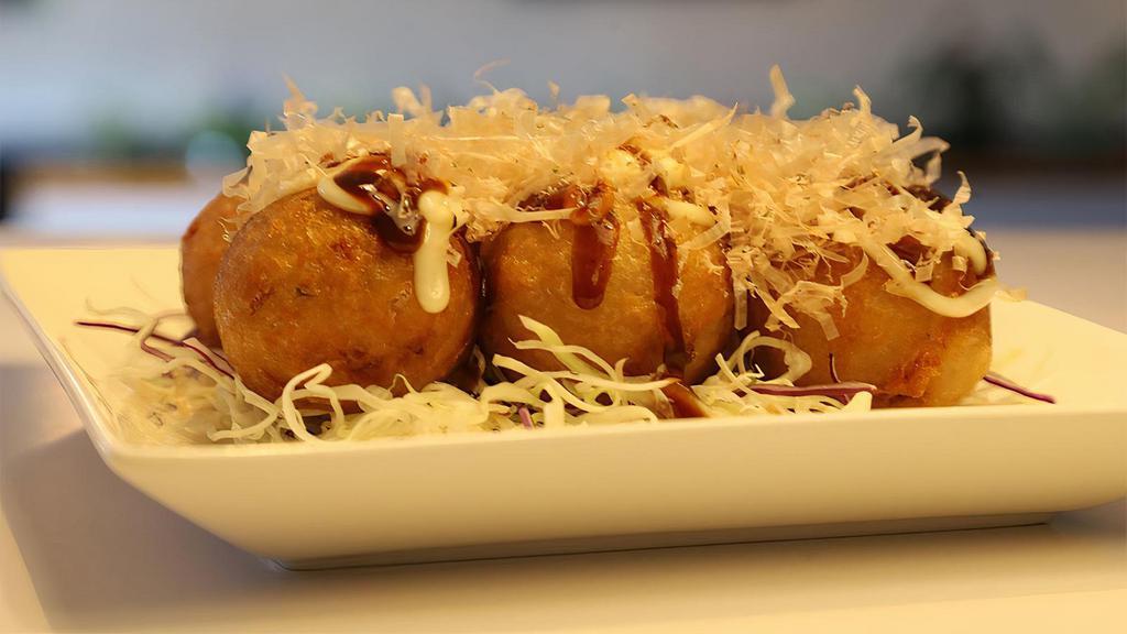 Takoyaki · battered and fried octopus (6), topped w/ teriyaki sauce, mayo, bonito flakes