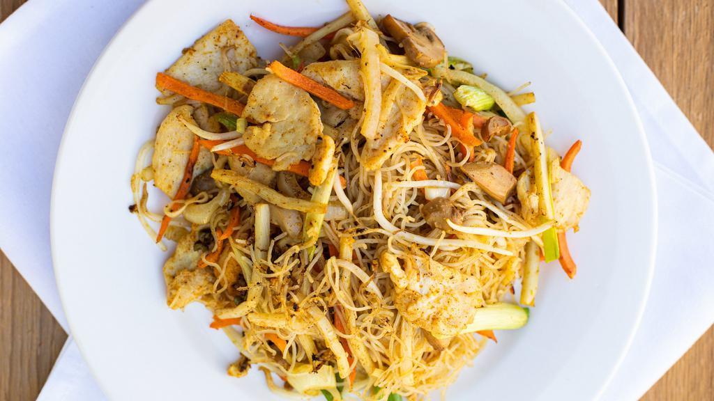 Singapore Noodle · Stir-fried vermicelli noodles with bamboo shoots, onion, wood ear mushrooms, carrots and bean sprouts in a curry sauce.