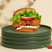 Hot Chase Sandwich · Crispy vegan fried chicken, mozzarella vegan cheese, pickles, lettuce, onion, tomato, mayo, ...