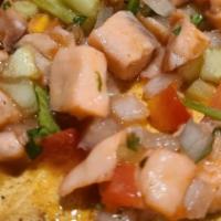 Mexican Tostada · A chicken, asada or shredded beef tostada; topped with lettuce, tomato, cheese, beans and on...