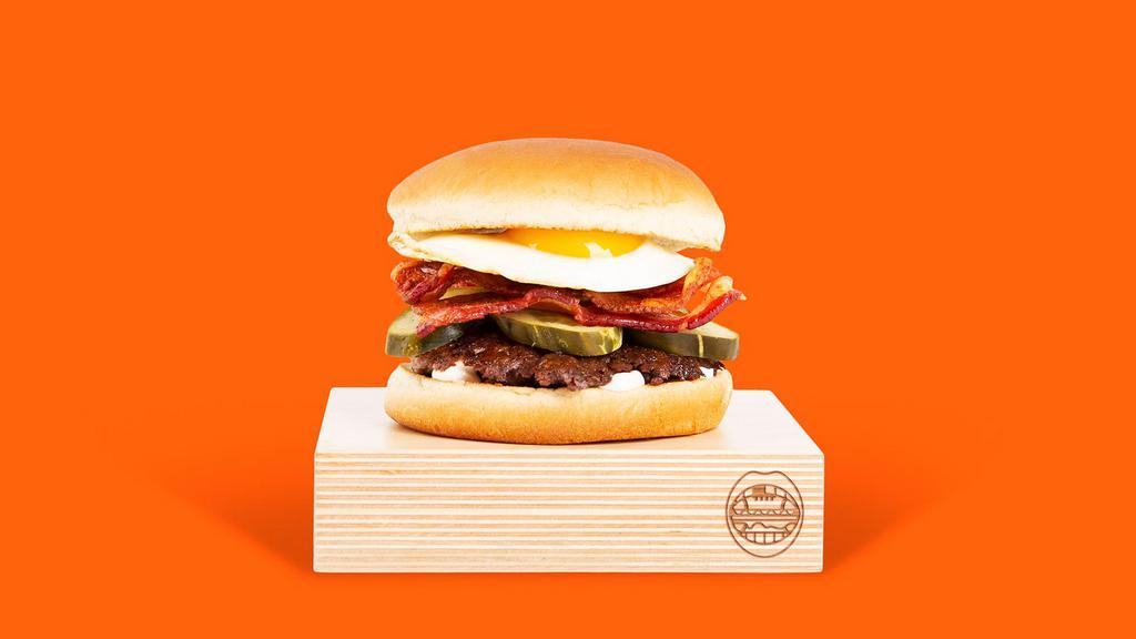 Egg And Bacon Smashmouth · Our signature smashed hamburger patty topped with bacon, a fried egg, American cheese, and mayo.