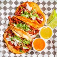 Tacos · Corn tortilla, cilantro, cebolla and choice of meat.