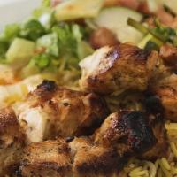 Chicken Kabob · Two skewers of cubed marinated chicken breast with bell pepper and onion. Served with garlic...