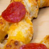 Baked Cheese Pretzel · Cheese baked pretzels. Your choice of pepperoni, jalapeño, or both. Perfect with cheese or p...