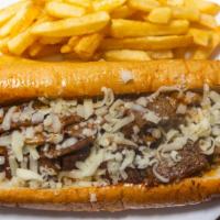 Philly Cheesesteak · bell-peppers onions, and provolone or cheese whiz and side fries