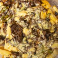 Cheesesteak Fries · fries Topped with steak. bell peppers, onions, cheese whiz, and Provolone.