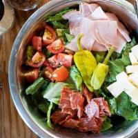 Antipasto  (Dd) · Romaine, Calabrese, cherry tomato, ham, pepperoncini, white cheddar. Served with Italian vin...