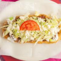 Huaraches · Choose your meat: filled in with beans, lettuce, sour cream.