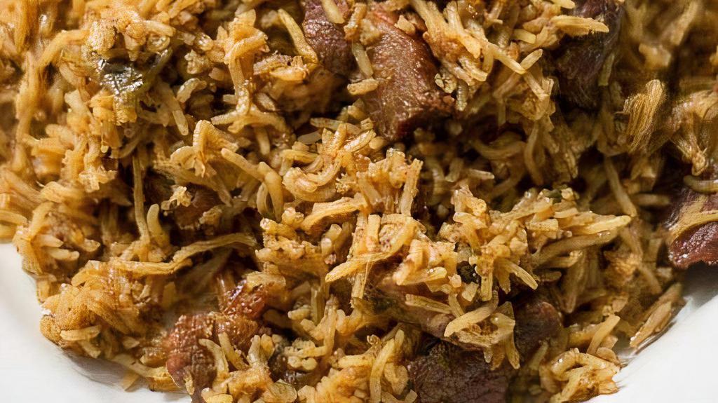 Mutton Biryani · Jeersamba rice flavored and cooked with fresh goat meat [farm raised] in a delicate blend of special biryani spices and herbs