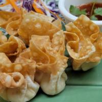 Crab Delight / เกี๊ยวห่อชีส (6Pcs) · Imitation crab meat mixed cream cheese and wrapped in a wonton skin, deep-fried to perfectio...