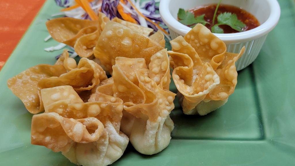 Crab Delight / เกี๊ยวห่อชีส (6Pcs) · Imitation crab meat mixed cream cheese and wrapped in a wonton skin, deep-fried to perfection and served with plum sauce.
