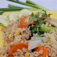 Thai Fried Rice / ข้าวผัดรถไฟ · Chicken, Pork, Tofu. Beef or Shrimp. Stir-Fried rice with egg, tomatoes, carrots, Chinese ka...