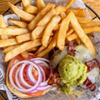 California Burger · Smoked bacon, guacamole and Monterey Jack cheese. Garnished with shredded iceberg lettuce, o...