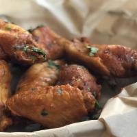 Buffalo Wings · Choice of tequila-cilantro, medium spicy or wicked habanero sauce. Choice of buttermilk ranc...