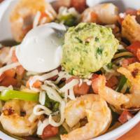 Baja Bowl · Your choice of meat, cilantro lime white rice and pinto beans, shredded lettuce, cheese, tom...