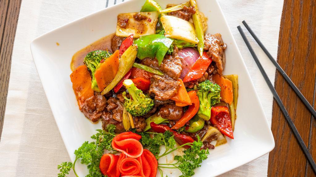 Black Pepper Beef 🌶️ · First seared, then stir-fried premium beef with fresh bell peppers and onions. Prepared hot and spicy.