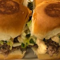 Kalua Pork Sliders · Pork shoulder, Hawaiian sea salt and pineapple wrapped in banana leaves and slow cooked for ...