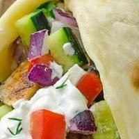 Classic Gyro · Lamb & beef served with mix salad and tzatzik sauce wrapped in pita