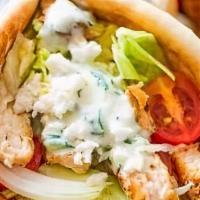 Chicken Gyro · Marinated grilled chicken breast served with mix salad and tzatziki sauce wrapped in pita