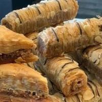 Baklava · Honey, walnuts, spices layered in the filled dough.