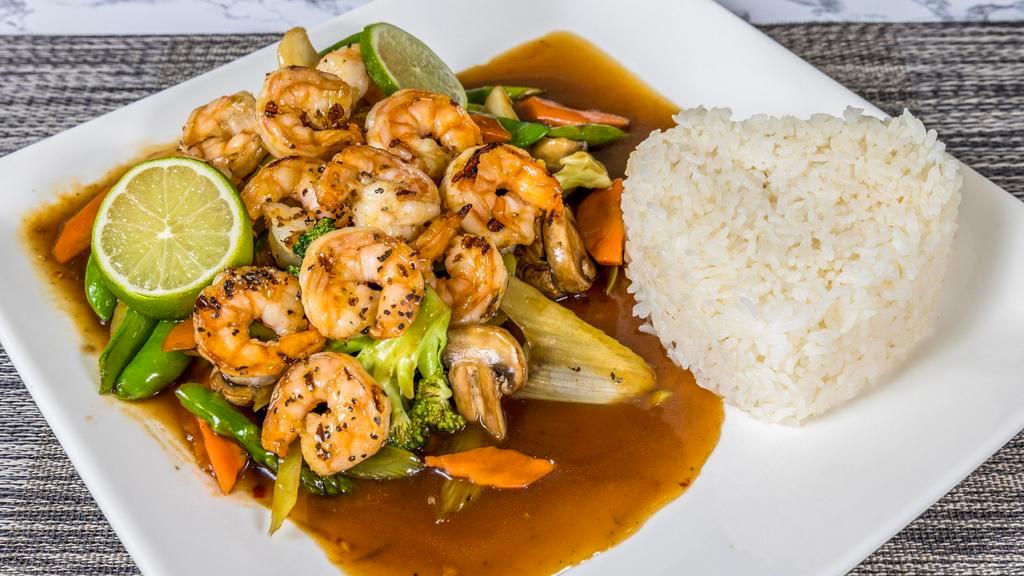 Grilled Lime Pepper Shrimp · Smoke flavored jumbo shrimp from the grill, topped with butter and lime pepper seasoning.