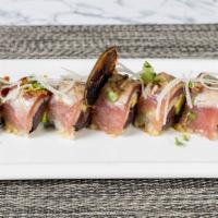 Diablo Roll · Spicy tuna, avocado, with seared tuna butter garlic sauce and ponzu sauce.