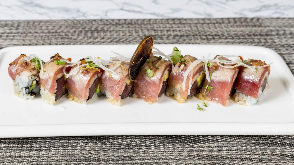 Diablo Roll · Spicy tuna, avocado, with seared tuna butter garlic sauce and ponzu sauce.