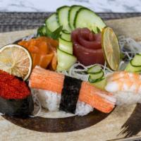 Sushi & Sashimi Deluxe · Chef's selection 5pcs Sushi & 10pcs Sashimi + California Roll.