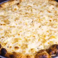 7 - White Pizza · Mozzarella, ricotta, parm, caramelized onions, garlic and sesame crust.