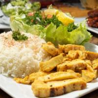 Luv Chicken Plate · With rice & salad, made with spices and veggies.